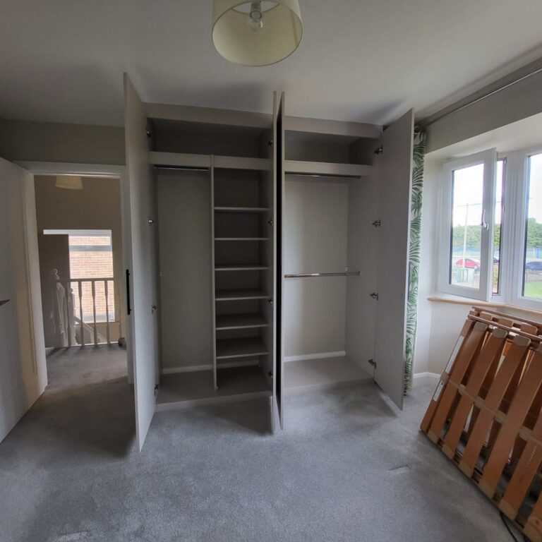 Made-to-measure fitted wardrobe with open shelving, hanging storage and a corner wardrobe design.